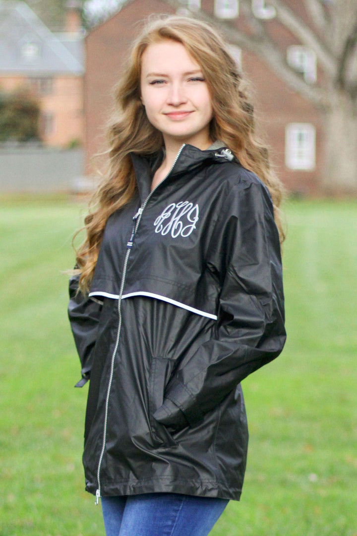 black monogrammed full-zip rain jacket
