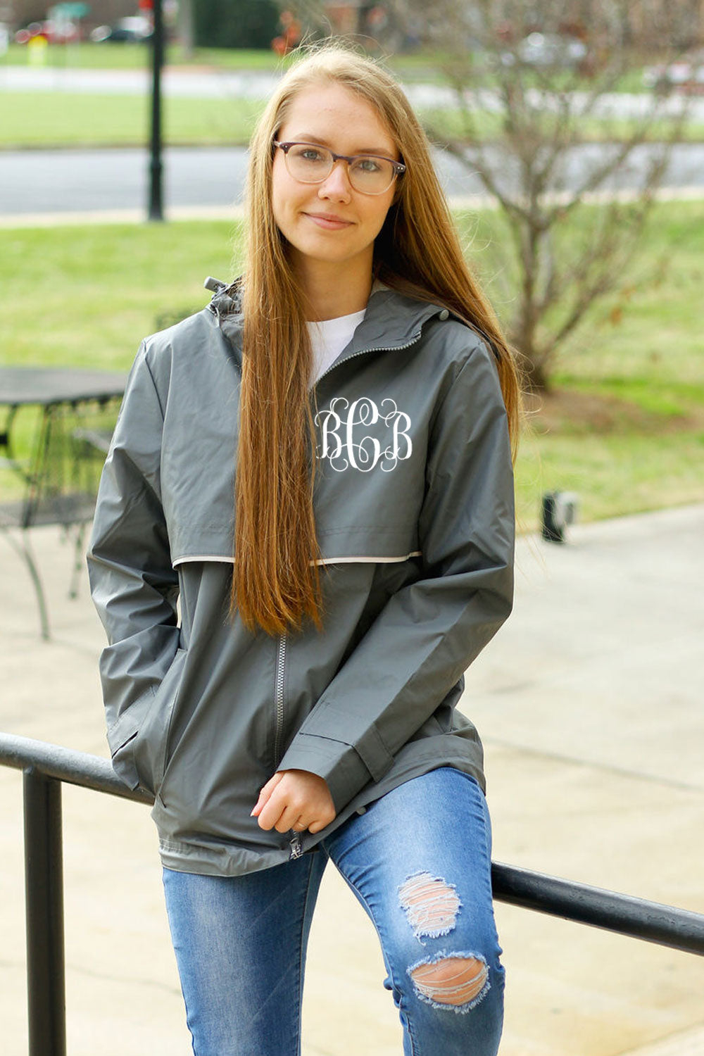teen girl sitting on rail wearing Grey Womens Chrles River New Englander Raincoat with Monogram Embroidery